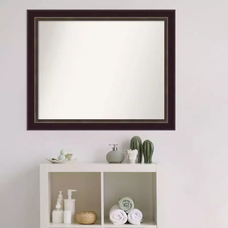 Miroir mural en bronze et bois