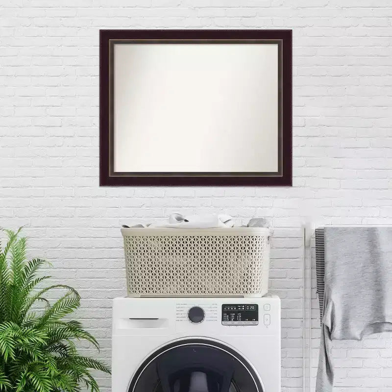 Miroir mural en bronze et bois