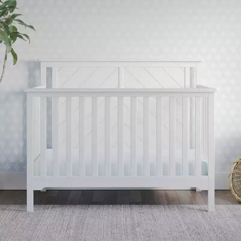 Lit bébé multifonctionnel quatre-en-un